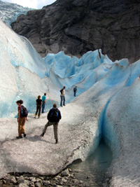 field researchers on glacier